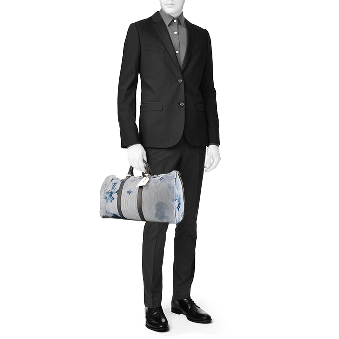 Bolsa de viaje Louis Vuitton Keepall Editions Limitées en lona monogram azul y blanca y cuero azul - Detail D1