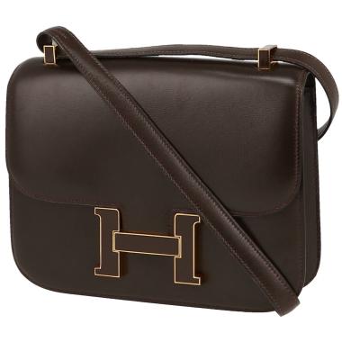 Bolso de mano Hermes Hermes Constance 24 cm en cuero box marrón chocolate y esmalte marrón
