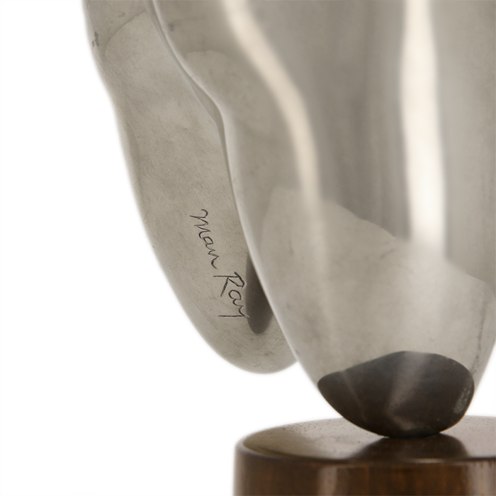 Man Ray, small "Herma" sculpture, in polished silver metal on a wood base, Artcurial edition, signed and numbered, model designed in 1975