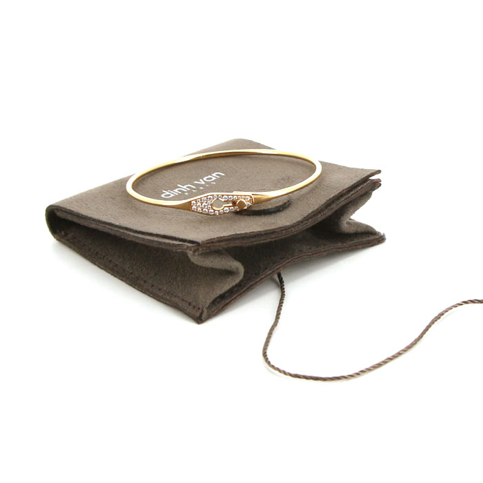 Bracelet ouvrant Dinh Van Serrure en or rose et diamants