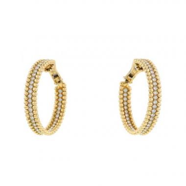 Orecchini a cerchio Van Cleef 
Arpels Perlée in oro giallo e diamanti