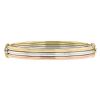 Opening Cartier Trois ors bangle in white gold,  yellow gold and pink gold - 00pp thumbnail
