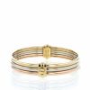 Opening Cartier Trois ors bangle in white gold,  yellow gold and pink gold - Detail D1 thumbnail