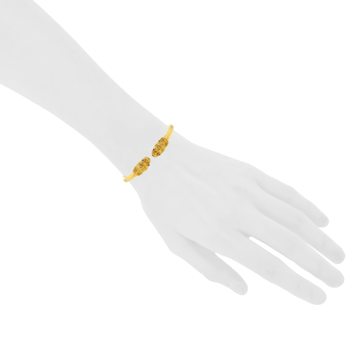 Brazalete redondo que se puede abrir Lalaounis Animal Head en oro amarillo y rubíes