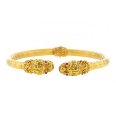 Brazalete redondo que se puede abrir Lalaounis Animal Head en oro amarillo y rubíes
