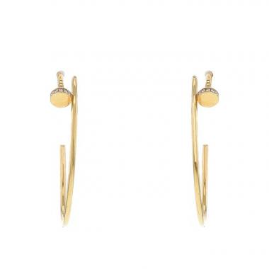 Orecchini a cerchio Cartier Juste un clou modello grande in oro rosa e diamanti