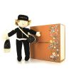 Louis Vuitton, "Groom", doll, in cotton, acrylic and polyester, with two iconic bags of the brand, monogrammed, in its original box, from the 2000's - Detail D4 thumbnail