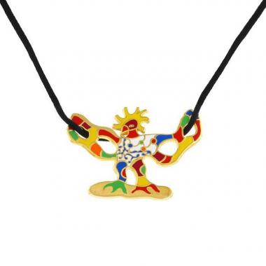 Niki de Saint Phalle, gilt-metal and polychrome enamel "Firebird" pendant-pin by Niki de Saint Phalle, limited edition Flammarion, signed, from the 1990's