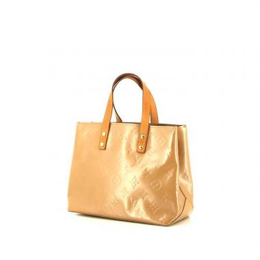 Louis Vuitton Reade handbag in beige monogram patent leather and natural leather