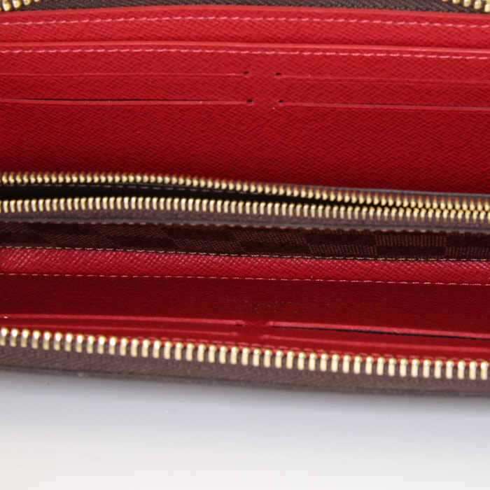 Louis Vuitton Zippy wallet in ebene damier canvas and red leather - Detail D5
