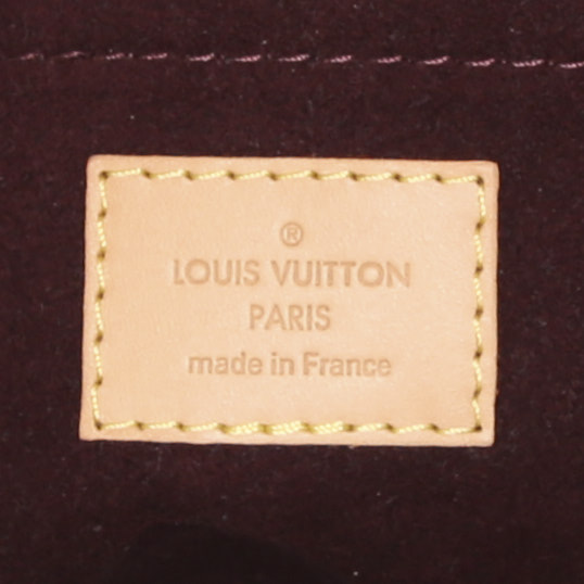 Bolso de mano Louis Vuitton Montaigne en lona Monogram revestida marrón y cuero natural - Detail D4