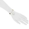 Van Cleef & Arpels Magic Alhambra bracelet in yellow gold,  mother of pearl and onyx - Detail D1 thumbnail