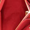 Shopping bag Louis Vuitton Surène in tela monogram marrone e pelle rosso ciliegia - Detail D2 thumbnail