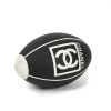 Chanel, Rugby ball, sport accessory, in black and white grained rubber, limited edition, with the logo and its original dustbag, from the 2000's - Detail D1 thumbnail