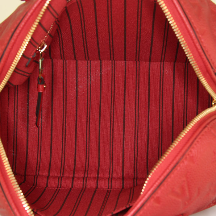 Sac à main Louis Vuitton  Speedy 25 en cuir monogram empreinte rouge - Detail D3