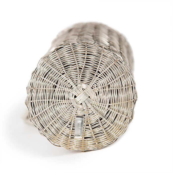 Christian Dior, thermos flask in silvered metal imitating the work of basketry, signed, from the beginning of the 1980's