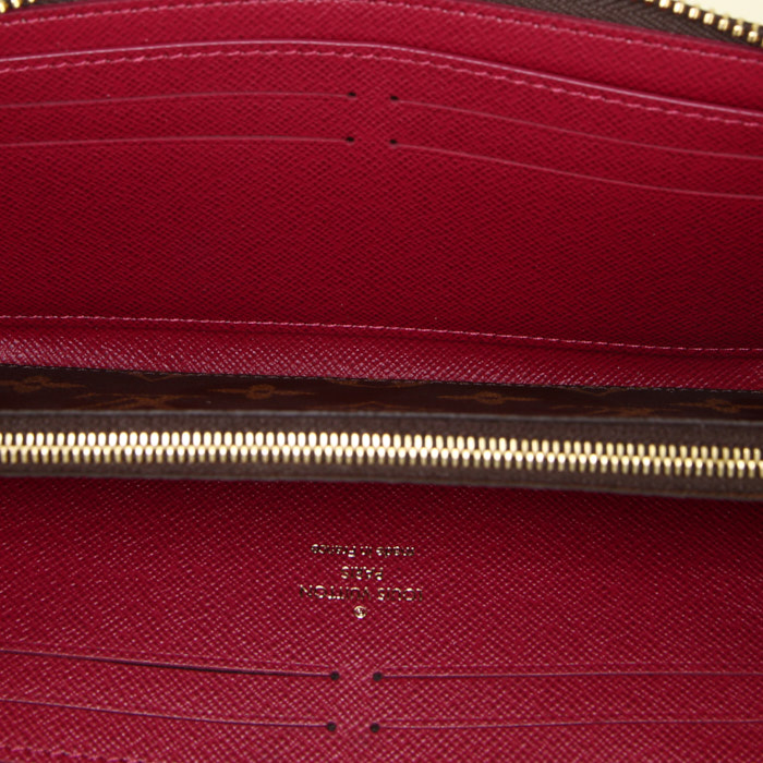 Billetera Louis Vuitton Clémence en lona Monogram marrón y cuero granulado fucsia - Detail D2