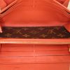 Billetera Louis Vuitton en lona Monogram marrón y cuero rojo - Detail D2 thumbnail