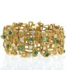 Articulated Vintage 1970's bracelet in yellow gold,  emerald and diamonds - 360 thumbnail