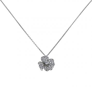 Pendentif/broche Van Cleef & Arpels Cosmos moyen modèle en or blanc et diamants