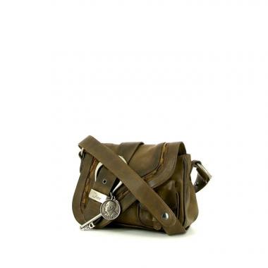 Dior Gaucho bag worn on the shoulder or carried in the hand in brown leather