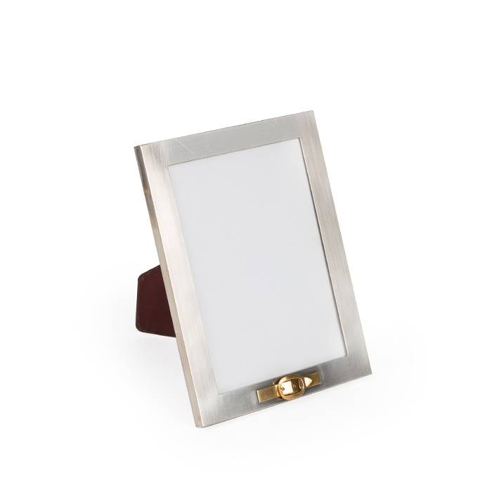 Hermès, rare photo frame "Boucle", in silvered metal, gilded brass and burgundy leather, from the 1980's - 00pp