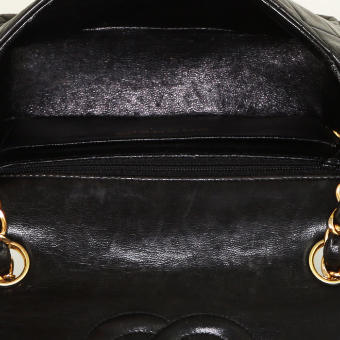 Chanel Mini Timeless handbag in black quilted leather - Detail D2
