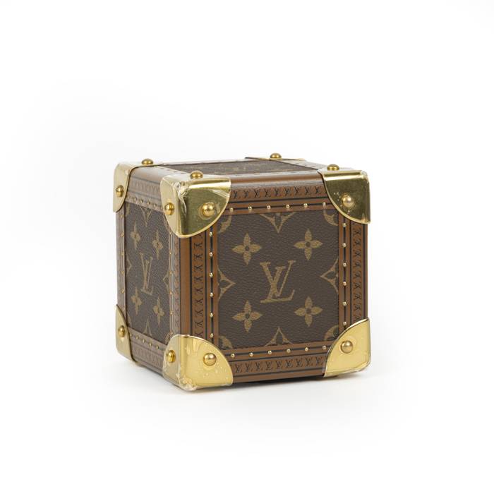 A Louis Vuitton suitcase in natural cow hide