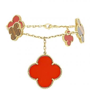 Van Cleef & Arpels Magic Alhambra bracelet in yellow gold,  cornelian and tiger eye stone