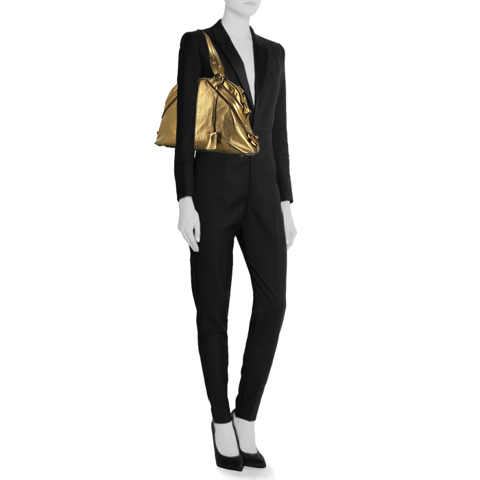 Yves Saint Laurent Muse handbag in gold leather and brown leather - Detail D1