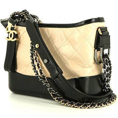Bolso bandolera Chanel Gabrielle  modelo pequeño en cuero acolchado beige y cuero liso negro
