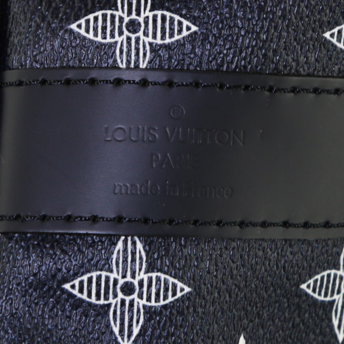 Louis Vuitton Keepall 55 cm travel bag in navy blue and white monogram canvas and navy blue leather - Detail D4