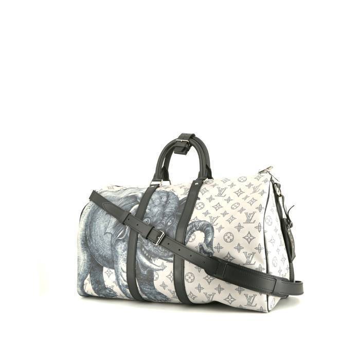 Louis Vuitton Keepall 55 cm Chapman Brothers travel bag in off-white and navy blue monogram canvas and navy blue leather - 00pp