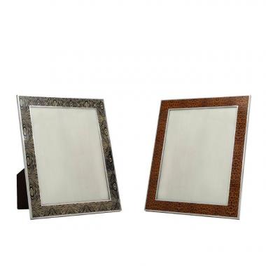 Christian Dior, two rare frames, in sterling silver and enamel, with zebra and leopard pattern, signed, from the 1980’s