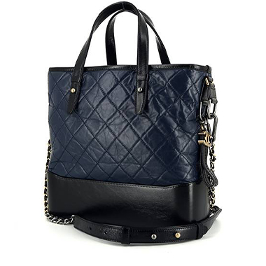 Bolso bandolera Chanel  Gabrielle  modelo mediano  en cuero acolchado azul marino y cuero liso negro