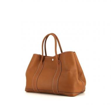Hermès, a green canvas and brown leather 'Garden Party' bag. - Bukowskis