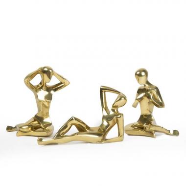 Riccardo Scarpa, Suite de trois sculptures "femmes", en bronze poli doré, signées et numérotées, des années 1970