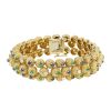 Bracelet années 70 Vintage  en or jaune, diamants, saphirs et émeraudes - 00pp thumbnail
