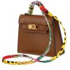 Hermès  Kelly Twilly bag charm handbag/clutch  in gold Tadelakt leather  and multicolor silk - 00pp thumbnail