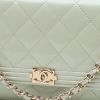 Chanel Wallet on Chain handbag/clutch in Almond green quilted iridescent leather - Detail D1 thumbnail