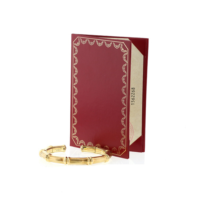 Hald-rigid Cartier Bambou  1990's bangle in yellow gold