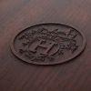 Hermès, Grande boîte carrée en bois de palissandre, à décor sculpté du symbole Hermès, signée, de 2015 - Detail D1 thumbnail