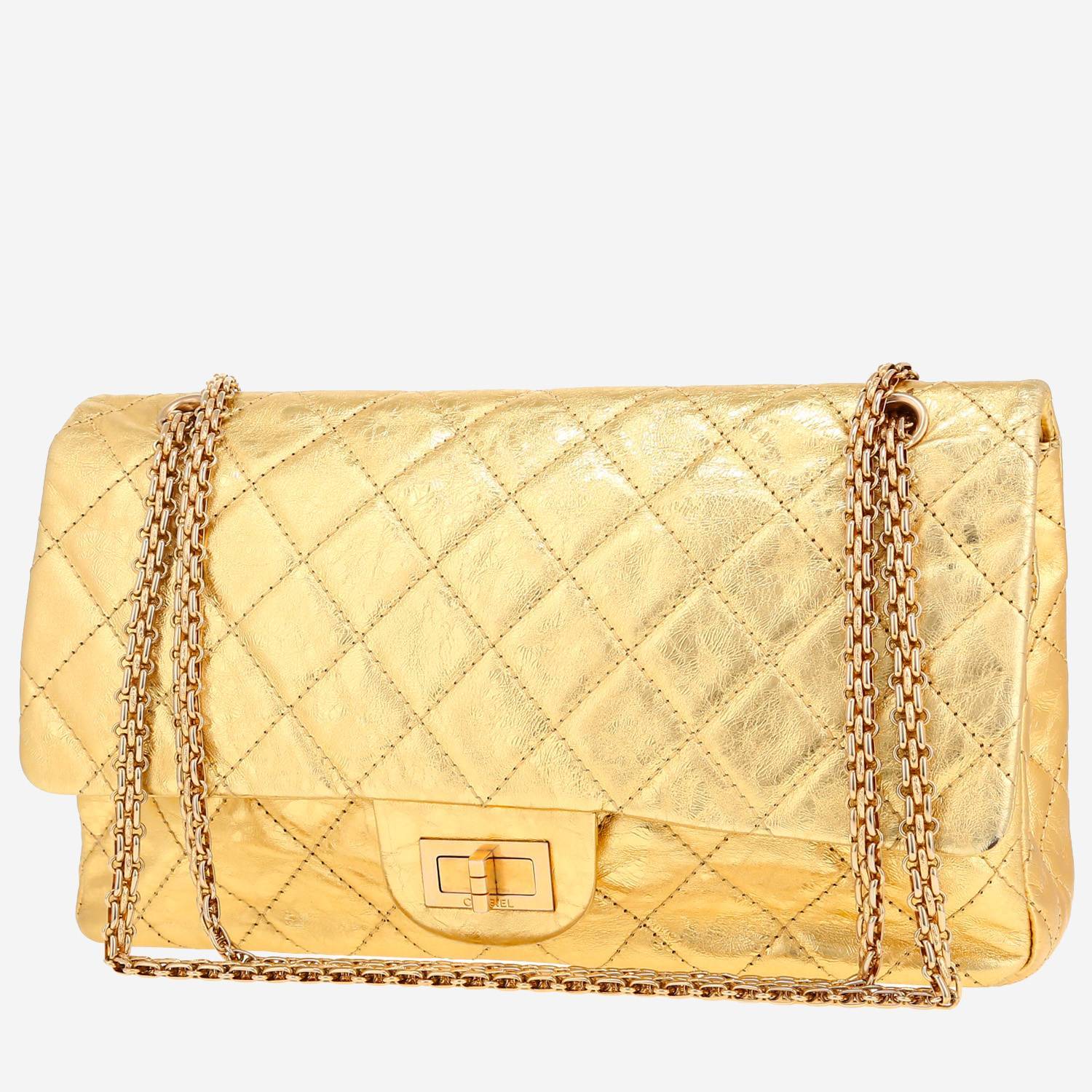 Chanel 2.55 handbag  in gold quilted leather
