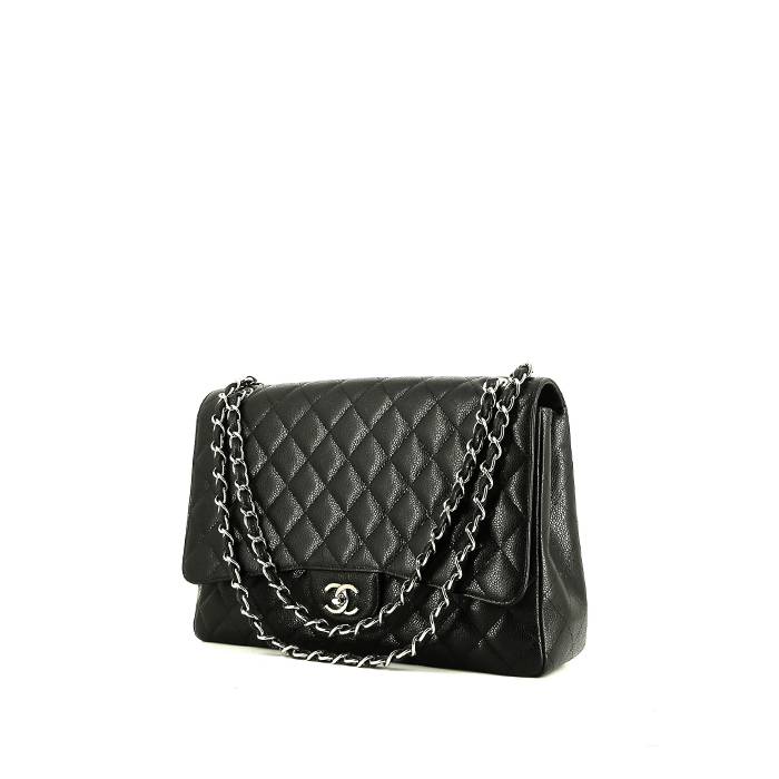 Chanel  Timeless Maxi Jumbo shoulder bag  in black quilted grained leather - 00pp