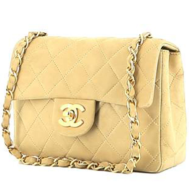 Bolso bandolera Chanel  Mini Timeless en ante beige