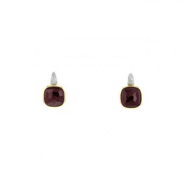 Pomellato Shéhérazade earrings in white gold, yellow gold and garnetsand in diamonds
