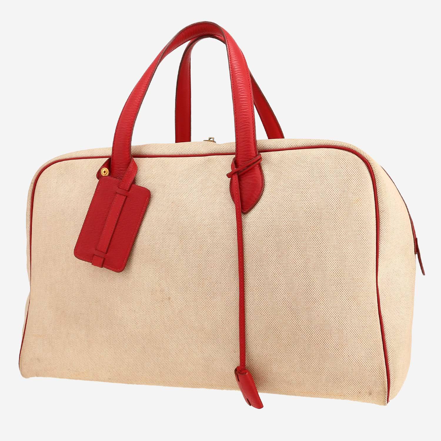 Hermès  Victoria - Travel Bag travel bag  in red leather  and beige canvas