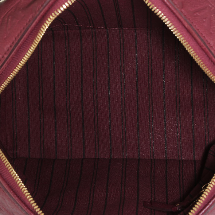 Sac à main Louis Vuitton  Speedy 25 en cuir monogram empreinte rose-framboise - Detail D3