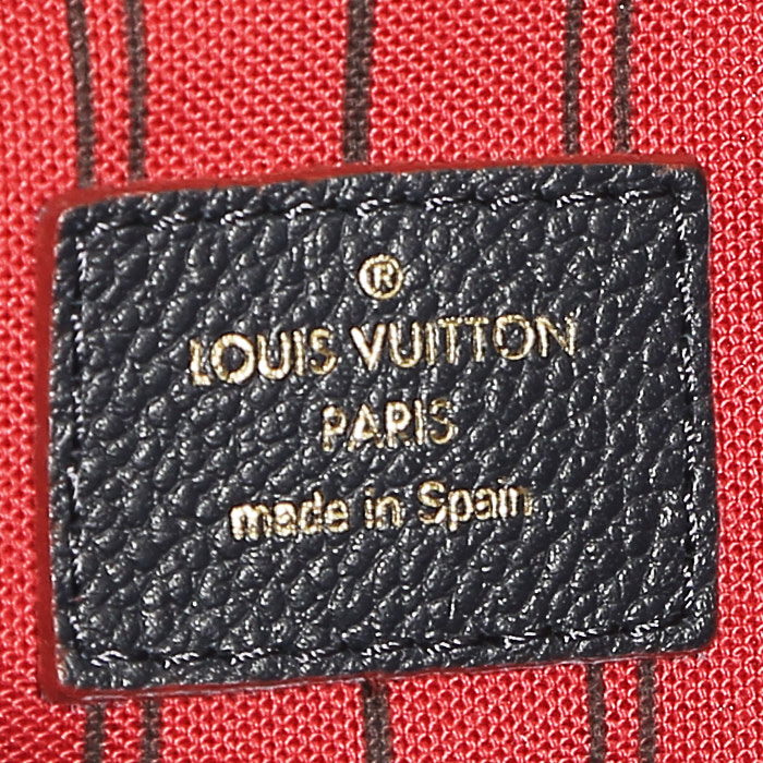 Louis Vuitton  Artsy medium model  handbag  in navy blue empreinte monogram leather - Detail D3
