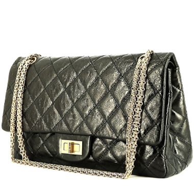 Chanel  Chanel 2.55 handbag  in black quilted iridescent leather